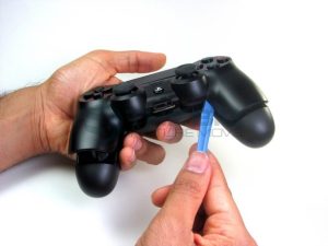 slightly squash both knob parts of Ps4 Controller